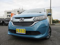 フリードハイブリッド ハイブリッド・EX 車検2年付き 雹害 6人 LKAS ブレーキサポート レーンキープ 標識認識機能 先行車発進警報 クルコン メモリナビ BluetoothフルセグTV バックカメラ ETC 両側電動スライドドア 中古車画像