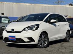 フィット e:HEVホーム ホンダセンシング・フルセグナビ・バックカメラ・BTオーディオ・ETC・USB・スマートキー・LEDヘッドライト・AUTOハイビーム・Cソナー・ハーフレザー・革ステア・純正16AW・フロアマット 中古車画像