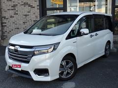 ステップワゴンスパーダ スパーダハイブリッド G ホンダセンシング 純正9インチメモリーナビ フルセグTV Bluetooth Bカメラ ETC 両側自動ドア スマートキー オートAC クルコン ホンダセンシング LEDライト 純正アルミ 7人乗り 中古車画像