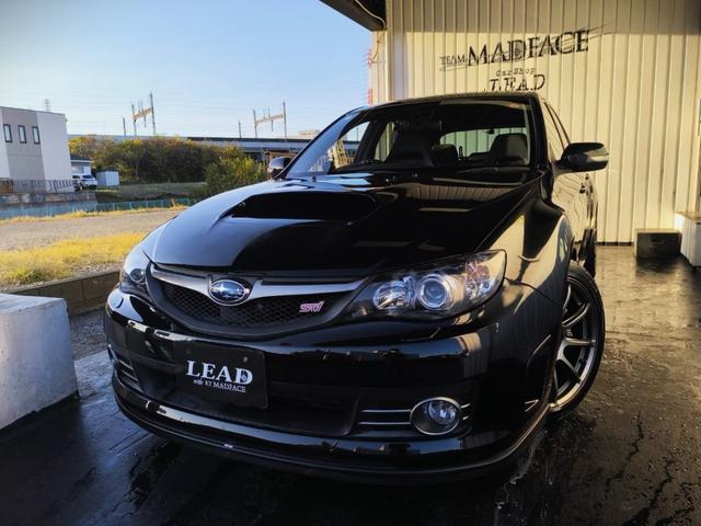 インプレッサ(スバル) ＷＲＸ　ＳＴｉ　ＺＥＲＯ　ＳＰＯＲＴインテークパイプ／ＳＴｉ純正オプションマフラー・フロントリップ／ＨＫＳDampers／Ｄｅｆｉブースト計／ＮＡＲＤＩステアリング／Ｇ．ｓｐｅｅｄ　Ｇ−０１　１８インチホイール 中古車画像