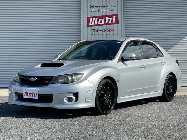 インプレッサ(スバル) ＷＲＸ　ＳＴＩ　Ａライン　４ＷＤ　ターボ　パナソニックナビ　ＤＴＶ　ＥＴＣ　プッシュスタート　パドルシフト　ハーフレザーシート　ＳＴＩトランクスポイラー　ヴァレンティスモークテール　ガナドールマフラー　ＷＯＲＫ１９インチＡＷ 中古車画像
