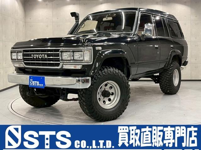 ランドクルーザー６０ ＶＸ　ユーザー様直接仕入れ　サンルーフ　リフトアップ　シュノーケル　１ナンバー登録５人乗り　ハイルーフ　社外１５インチＡＷ　ＭＴタイヤ　社外ナビ　ＮＡＲＤＩウッド調ステア　エアコン　予備キー　ＥＴＣ　実走行（1枚目）
