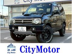 ジムニー ワイルドウインド 4WD・MT車・ルーフレール・フロントフォグランプ・電動格納ミラー・革巻きステアリング・SRSエアバック(運転席/助手席)・シートヒーター・社外アルミ・ABS・社外オーディオ・車検:令和9年8月! 中古車画像