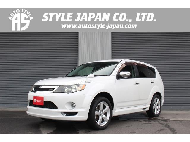 アウトランダー(三菱) ２４Ｇ　４ＷＤ　７人乗り　フロント／サイド／リアエアロ　純正ナビ　バックカメラ　ＥＴＣ　ＨＩＤヘッドライト　ハーフレザーシート　ステアリングスイッチ　スマートキー　１００Ｖ電源 中古車画像