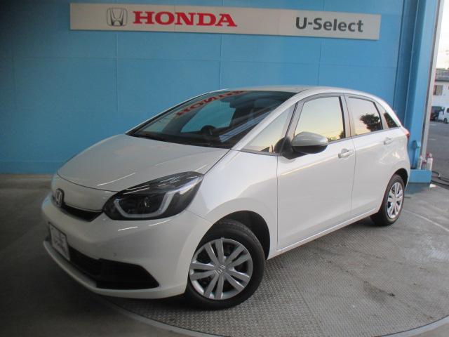 フィット（ホンダ）ｅ：ＨＥＶホーム　当社登録済未使用車　ナビ装着用スペシャルパッケージ　フルオートエアコン　ＬＥＤヘッドライト　ホンダセンシング　スマートキー　前後誤発進抑制機能　助手席エアバッグ　運転席エアバッグ　１オナ　禁煙　ＡＢＳ 中古車画像