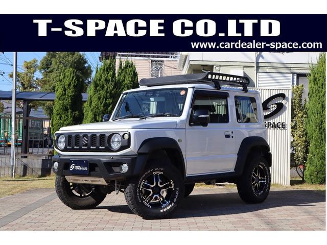 ジムニーシエラ(スズキ) ＪＣ　ＪＡＯＳスポーツカウル　スキッドプレート　丸型ＬＥＤテール　ＢＡＴＴＬＥＺマフラー　ＭＫＷ１６インチＡＷ　ＯＰＥＮＣＯＵＮＴＲＹ．Ｒ／Ｔタイヤ　ＣＡＮＵＳリフトアップDampers　　ルーフラック　リアラダー 中古車画像