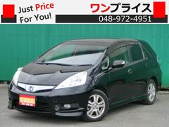 フィットシャトルハイブリッド ハイブリッド・ナビプレミアムセレクション スマートキー 純正ナビ ワンセグ DVD バックカメラ VTR端子付き HID 純正AW プライバシーガラス ドアバイザー 中古車画像