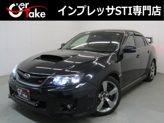 ＷＲＸ　ＳＴｉ　アプライドＥ型　後期　６速ＭＴ　ブラックハーフレザーシート　ブレンボキャリパー　１８インチＡＷ　柿本改スポーツマフラー　Ｄｅｆｉ追加メーター　大型リヤスポイラー　ナビＢカメラ地デジ　ブルートゥース