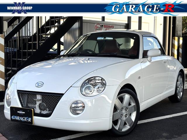 コペン(ダイハツ) アクティブトップ　５速ＭＴ　電動オープン　赤レザーシート　シートヒーター　純正１５インチアルミホイール　純正マフラー　ＫＥＮＷＯＯＤオーディオ　フォグランプ　キーレス　ＥＴＣ 中古車画像