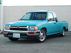 ハイラックス エクストラキャブ 左ハンドル 2WD V6 3000cc 純正サンルーフ フロアAT BOYDS16インチ サイド出しマフラー サーフバンパー 社外ステアリング 中古車画像