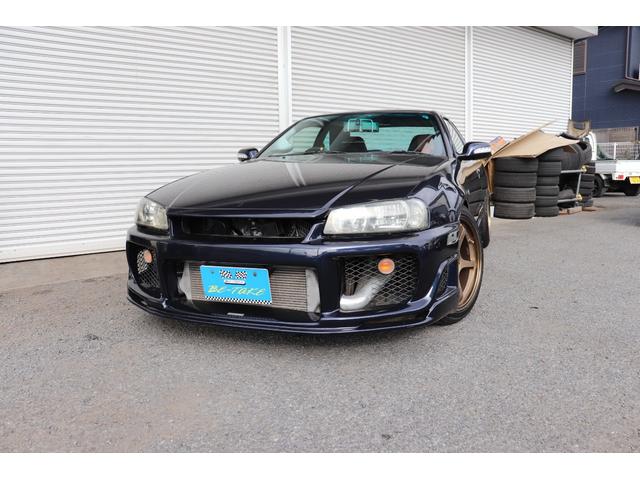 スカイライン(日産) ２５ＧＴターボ　トミーカイラフロントバンパー　ＢＮＲ３４純正フロントフェンダー　イーストベアーサイドステップ＆リアバンパー　前後Ｆ５０ブレンボキット　ＨＫＳフロントパイプ　ＪIntercoolerマフラー　ＴＥＩＮDampers　クスコＬＳＤ 中古車画像
