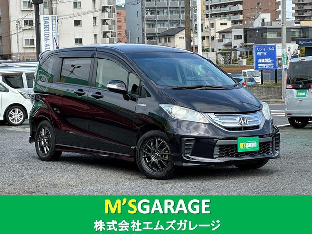 ジャストセレクション　純正メモリーナビＴＶ　バックカメラ　ＥＴＣ　両側電動スライドドア　スマートキー　クルーズコントロール　純正ハーフレザーシート　アイドリングストップ　社外１５インチＡＷ　禁煙車　ＤＶＤ再生　ＵＳＢ接続可