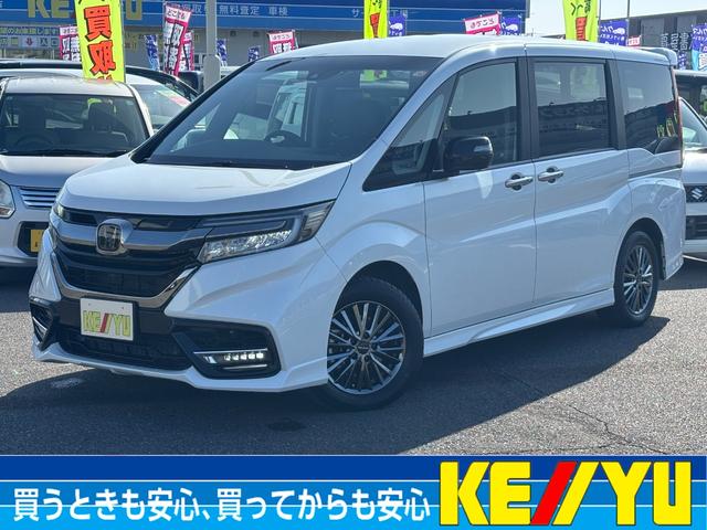 ステップワゴン(ホンダ) ｅ：ＨＥＶモデューロＸ　ホンダセンシング　禁煙１オーナー　純正１０型ナビ　全方位カメラ　後席モニター　ＥＴＣ２．０　ナビ連動ドラレコ　両側電動スライド　Ｂｌｕｅｔｏｏｔｈオーディオ　フルセグＴＶ　ＤＶＤ再生　シートヒーター　ＨＤＭＩ　純正ＡＷ 中古車画像