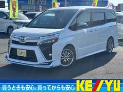 ヴォクシー ZS 煌III 禁煙車 モデリスタエアロ 純正10型SDナビ 後席モニター 両側電動スライド バックカメラ ETC Bluetoothオーディオ フルセグTV DVD再生 衝突軽減装置 車線逸脱警報 コーナーセンサー 中古車画像