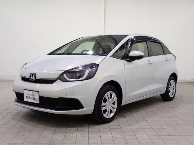 フィット ホーム 禁煙1オーナー 9インチナビ ホンダセンシング 渋滞追従 パーキングセンサー トラフィックジャム Bluetooth リアカメラ プライムスムース×ナチュラルテキスタイルコンビシート ドアバイザー(1枚目)