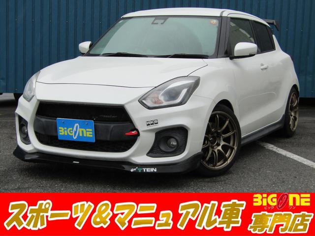 スイフトスポーツ(スズキ) ベースグレード 6速 ターボマニュアル車 TEIN車高調 HKSフラッシュエディター ロッソモデロマフラー モンスタースポーツリアスポイラー トラストフロントリップ アドバンRZ−2 17AW 強化アッパー 中古車画像