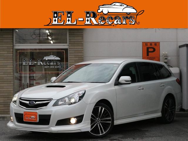 レガシィツーリングワゴン(スバル) ２．５ＧＴ　Ｓパッケージ　電動ハーフレザーシート・Ｂｌｕｅｔｏｏｔｈ接続・ＦＵＪＩＴＳＵＢＯマフラー・Aftermarket１９インチアルミ・フロントエアロ・フリップダウンモニター・ＥＴＣ・クルーズコントロール・スマートキー・パドルシフト 中古車画像