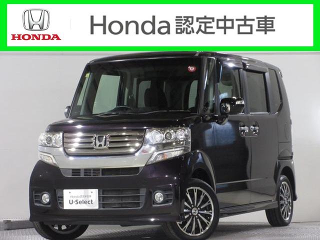 NBOXカスタム(ホンダ)G・ターボパッケージ ・ひょう害 ・平成25年2月登録 ・4万4千キロ ・車検2年付 ・ターボ ・4WD ・ナビ ・ETC ・スマートキー ・ドアバイザー ・両側電動スライドドア ・純正15インチアルミ ・1年保証 中古車画像
