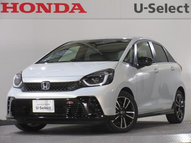 フィット（ホンダ）ｅ：ＨＥＶＲＳ　元当社社有車　禁煙車　ワンオーナー　純正９インチナビ／リアカメラ　ＥＴＣ　ＵＳＢ　パドルシフト　ブレーキホールド機能／電子パーキング　ＬＥＤオートライト　サイドカーテンエアバッグ　１６インチアルミ 中古車画像