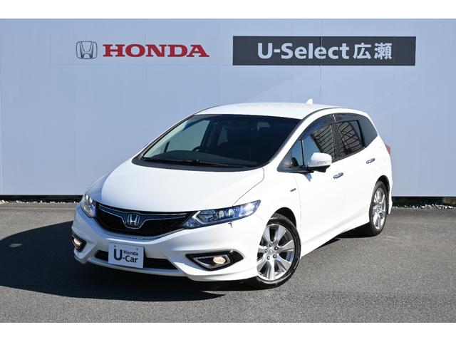 ジェイド(ホンダ) ハイブリッドＸ　ホンダセンシング　純正ナビ　フルセグ　Ｓ＆Ｒカメラ　ＥＴＣ　アルミホイール　ＬＥＤライト　ドライブレコーダ　スマキー　踏み間違い防止装置　横滑り防止　ＥＣＯモード　サイドカーテンエアバック　ナビＴＶ 中古車画像