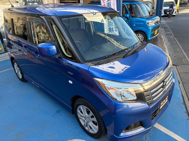 ソリオ(スズキ) ハイブリッドＭＸ　バックカメラ　フルセグＴＶナビ　ＥＴＣ　フロントドライブレコーダー　　ブルートゥース　レーンアシスト　衝突被害軽減システム　両側スライド・片側電動　電動格納ミラー　シートヒーター　フルフラット 中古車画像