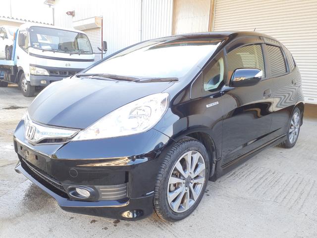 フィットハイブリッド(ホンダ) ＲＳ　１年走行無制限保障　６速ＭＴ　社外ナビ　フルセグＢｌｕｅｔｏｏｔｈ　ＵＳＢ　ビルトインＥＴＣ 中古車画像