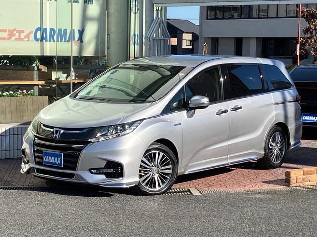 オデッセイハイブリッド(ホンダ) ハイブリッドアブソルート・ホンダセンシング　マルチビューカメラシステム　大型アームレスト　フリップダウンモニター　純正ナビ　ＴＶ　センターコンソールボックス　前後ドラレコ　クリアランスソナ　レーダークルコン　パークアシスト　衝突被害軽減　ＥＴＣ 中古車画像