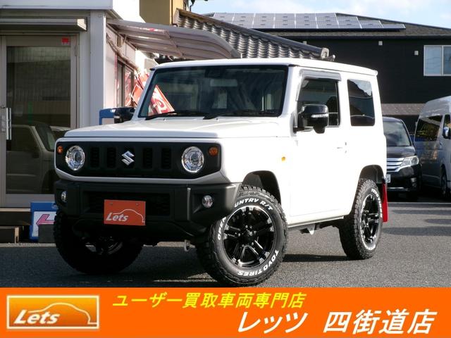 ジムニー(スズキ) ＸＣ　届出済未使用車・オープンカントリー・Aftermarketアルミ・９インチナビ・Ｂカメラ・純正マットフラップ・クルコン・純正バイザー・純正フロアマット・コーナーセンサー・車線逸脱・ＤＶＤ再生・Ｂｌｕｅｔｏｏｔｈ接続可 中古車画像