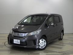 フリードハイブリッド ジャストセレクション+ 禁煙車サイドエアバッグ VSA 両側電動スライドドア HIDヘッドライト リアカメラ リアモニター ETC フルセグTV ブルートゥースオーディオ CD DVD クルーズコントロール スマートキー 中古車画像