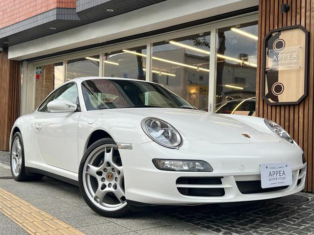 ９１１カレラ４　Ｄ車右Ｈ　純正ＯＰ（スポーツクロノＰＫＧ／ＰＡＳＭ／Ｓ・４Ｓ専用１９インチＡＷ／アルカンターラＲ／シートＨ）　黒本革　デュアルツインテールパイプ　カロッツェリアナビ・ＴＶ・Ｂカメラ　取説保記録　Ｓキー