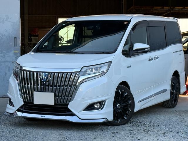 エスクァイア(トヨタ) ハイブリッドＧｉ　後期型　モデリスタフルエアロ　モデリスタリアスポイラー　ＲＡＹＳ１８インチＡＷ　純正１０インチナビ　純正１２．８インチフリップダウンモニター　Aftermarketスモークテール　AftermarketＬＥＤリフレクター　黒革シート 中古車画像