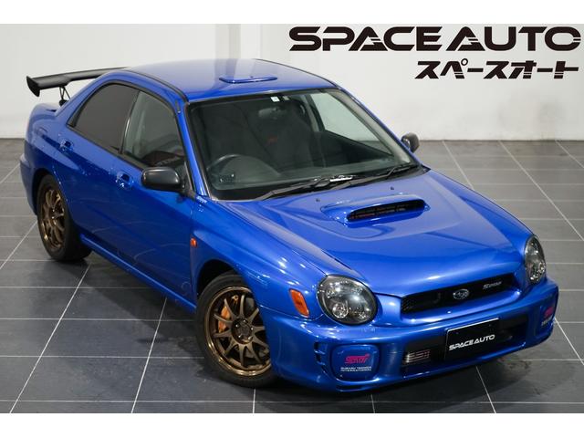 インプレッサ ＷＲＸ　Ｓ２０２　ＳＴｉバージョン　／平成１４年式／４００台限定車／ＳＴＩチタンマフラー／ルーフベンチレーター／ＳＴＩカーボンリアウイング／純正１７インチアルミ／実走行距離