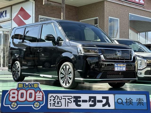 ホンダ ステップワゴン スパーダ　プレミアムライン　７人乗り　プラチナ調クロームメッキ加飾　２列目シートヒーター　ＰＲＥＭＩＵＭＬＩＮＥ専用アルミホイール　パワーテールゲート　　２列目オットマン　ブラインドスポットインフォメーション　登録済未使用車