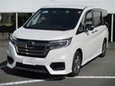 ステップワゴンスパーダ ｅ：ＨＥＶスパーダ　Ｇ　ホンダセンシング　７人　両側電動スライドドア　前ドライブレコーダー　ＥＴＣ２．０　メモリーナビ　Ｂｌｕｅｔｏｏｔｈ　フルセグＴＶ　無限ドアバイザー　ブレーキホールド　電子パーキング　禁煙ワンオーナー車（1枚目）