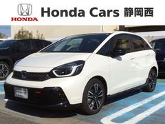 ホンダ　フィット　ｅ：ＨＥＶＲＳ　ＨｏｎｄａＳＥＮＳＩＮＧ新車保証試乗禁煙車　整備記録簿　盗難防止