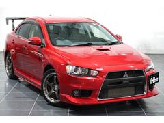 ランサー GSRプレミアムエボリューションX ファイナルSST/平成27年式/純正エアロパーツ(F・S・R)/VARISカーボンリヤウイング/アドバン18インチアルミ/HKSキャタライザー&マフラー/ロックフォードサウンド 中古車画像