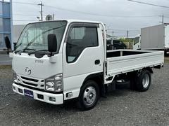 タイタントラック  ETC/ASR/左電動格納ミラー/パイオニア製社外ナビ/Bluetooth Audio/アイドリングストップ/フォグランプ付/リアダブルタイヤ/ミックスタイヤ装備 中古車画像