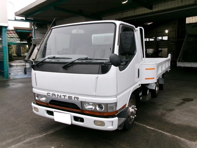 スライドダンプ　２ｔ　土砂禁　荷台内寸２８７０×２０７０　ＭＴ　後輪ダブル　ＥＴＣ　エアコン　パワーウィンドウ　運転席エアバッグ　青から白へ色変え　全塗装