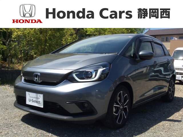 フィット ｅ：ＨＥＶネス　ＨｏｎｄａＳＥＮＳＩＮＧ２年保証ナビフルセグ　バックカメラ　ＤＶＤ再生　記録簿　ＬＥＤヘッドランプ　オートクルーズコントロール　禁煙　盗難防止装置　ＥＴＣ　スマートキー　ドライブレコーダー　地デジ