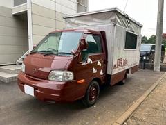 バネットトラック ロングスーパーローGL 2万K!CAT/エアコン/パワステ/パワーウィンドウ/Wタイヤ/ナビ/Bカメラ/ETC/ポップアップルーフ/出張作業/電動リクライニングチェア付/家庭用エアコン/照明/換気扇/外部電源接続/移動店舗 中古車画像