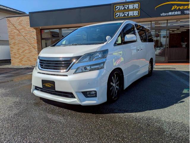 ヴェルファイア(トヨタ) 2.4Z 純正ナビ フルセグTV フリップダウンモニター 両側電動パワースライドドア バックモニター 社外20AW 車高調 HIDヘッドライト ドライブレコーダー 社外グリル 後期テール クラッチオシートカバー 中古車画像