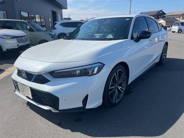 シビック(ホンダ) e:HEV EX クリアランスソナー レーンアシスト オートクルーズコントロール 衝突被害軽減システム バックカメラ ナビ アルミホイール オートライト LEDヘッドランプ サンルーフ CVT シートヒーター 中古車画像