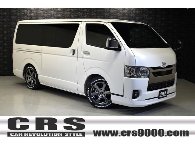 ハイエースバン トヨタ スーパーｇｌ ダークプライムｉｉ ｃｒｓ ｅｓｓｅｘ アウトドア 車中泊 キャンプ キャンピングカー ハイエースカスタム ホワイトパール デジミラ パノラミックビューモニタ パワースライドドア カスタムベッドキット ローダウン２
