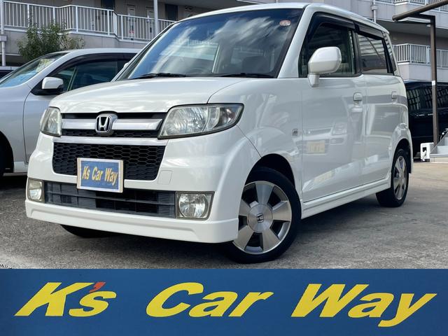 ゼスト(ホンダ) スポーツＷターボ　ターボ　ナビ　ＴＶ　ＣＤ　ＭＤ　ＥＴＣ　キーレス　ＨＩＤヘッドライト　フォグ　純正１４インチアルミ　オートエアコン　ＡＢＳ　ＷＳＲＳエアバッグ　ベンチシート　大型リアスポイラー　プライバシーガラス 中古車画像