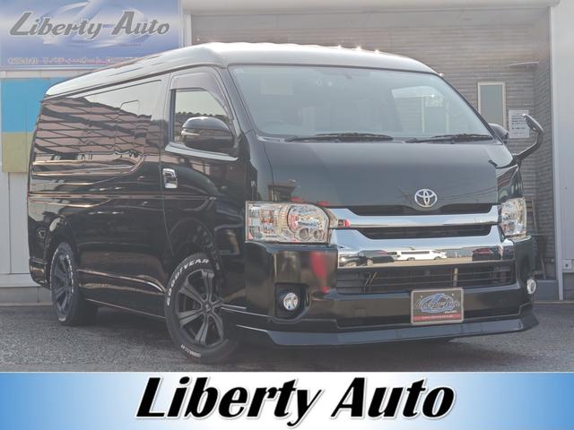 ハイエースワゴン(トヨタ) ＧＬ　ＲＥＶＯシート２脚　ロングスライドレール　フルフラットベッド　１０人乗公認　１オーナー　電動ドア　ナビフルセグブルートゥースオーディオ　フリップダウンモニター　バルベロ１７ＡＷホワイトレター　スポイラ 中古車画像