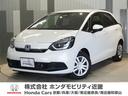 フィット ｅ：ＨＥＶホーム　当社デモカー　純正メモリーナビ　ホンダセンシング　ＬＥＤヘッドライト　オートハイビーム　ＥＴＣ　ドライブレコーダー　ＵＳＢ　スマートキー　両席エアバック　カーテンエアバック　サイドエアバッグ（1枚目）