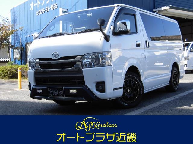 ハイエースバン ロングスーパーGLマルチロールトランスポータタイプII DプラIIMRTアルパイン11インチナビ デジタルミラー 後席モニター 純正ベッドキット 後席ピラースピーカー バックモニター ドライブレコーダー前後 GRフロントリヤスポイラー サイドステップETC(1枚目)