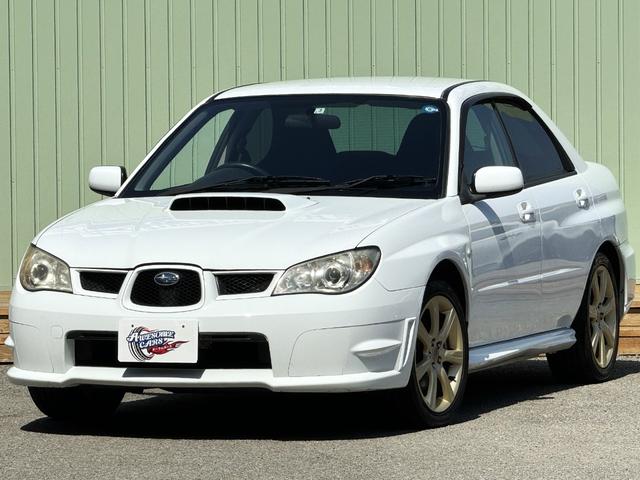 スバル インプレッサ ＷＲＸ　／５ＭＴ／ＥＪ２０／ターボ／ストラーダナビ／ミュージックサーバー／ＤＶＤ再生／ディスチャージ／キーレス／オートＡＣ／革巻ステアリング