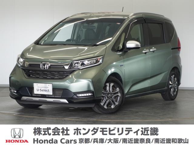 フリードハイブリッド ハイブリッド・クロスターホンダセンシング　２年保証ナビＤレコＲカメＥＴＣ両電扉ＢＴ地デジ（1枚目）