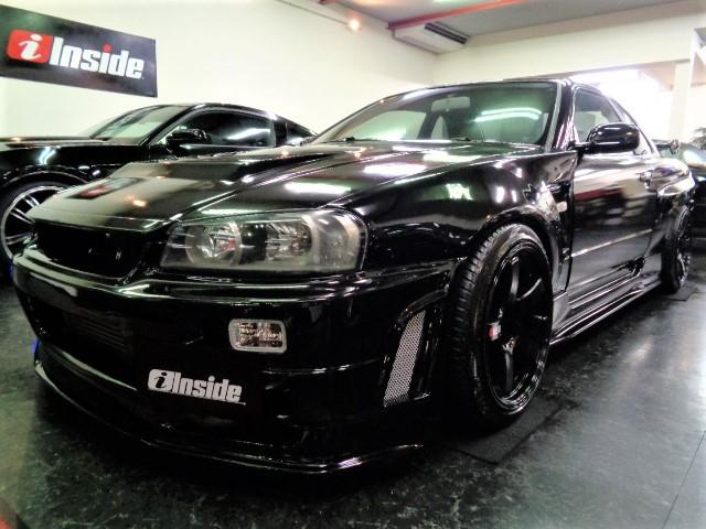 日産 スカイライン ２５ｇｔターボ 後期型ｒ３４ｇｔｒｖスぺックニスモｚチューン仕様フルエアロワイドボディ２ｄクーペｒｂ２５ｄｅｔターボｎｅｏ６エンジン５ｍｔマフラー車 高調足回りインターｃ前後対向キャリパ １８アルミｔベルト交換済ｈｉｄの中古車 グーネット